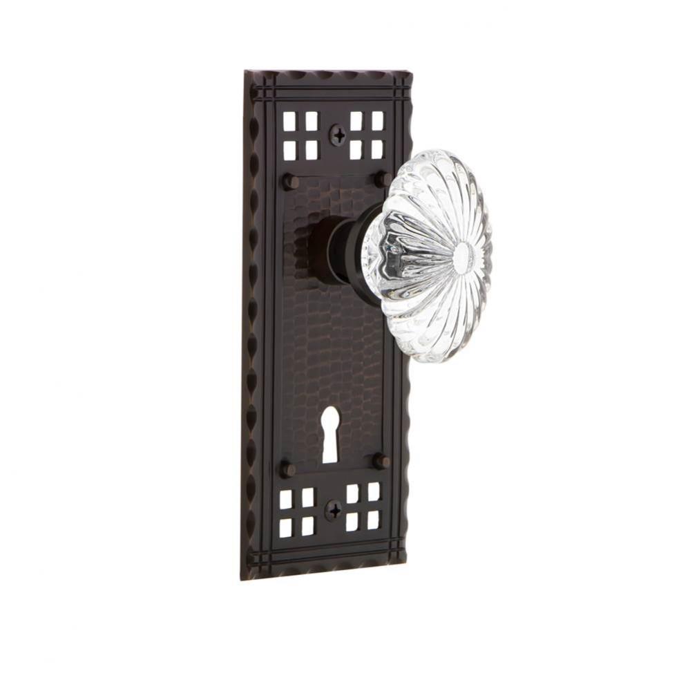 Nostalgic Warehouse Craftsman Plate with Keyhole Passage Oval Fluted Crystal Glass Door Knob in Ti
