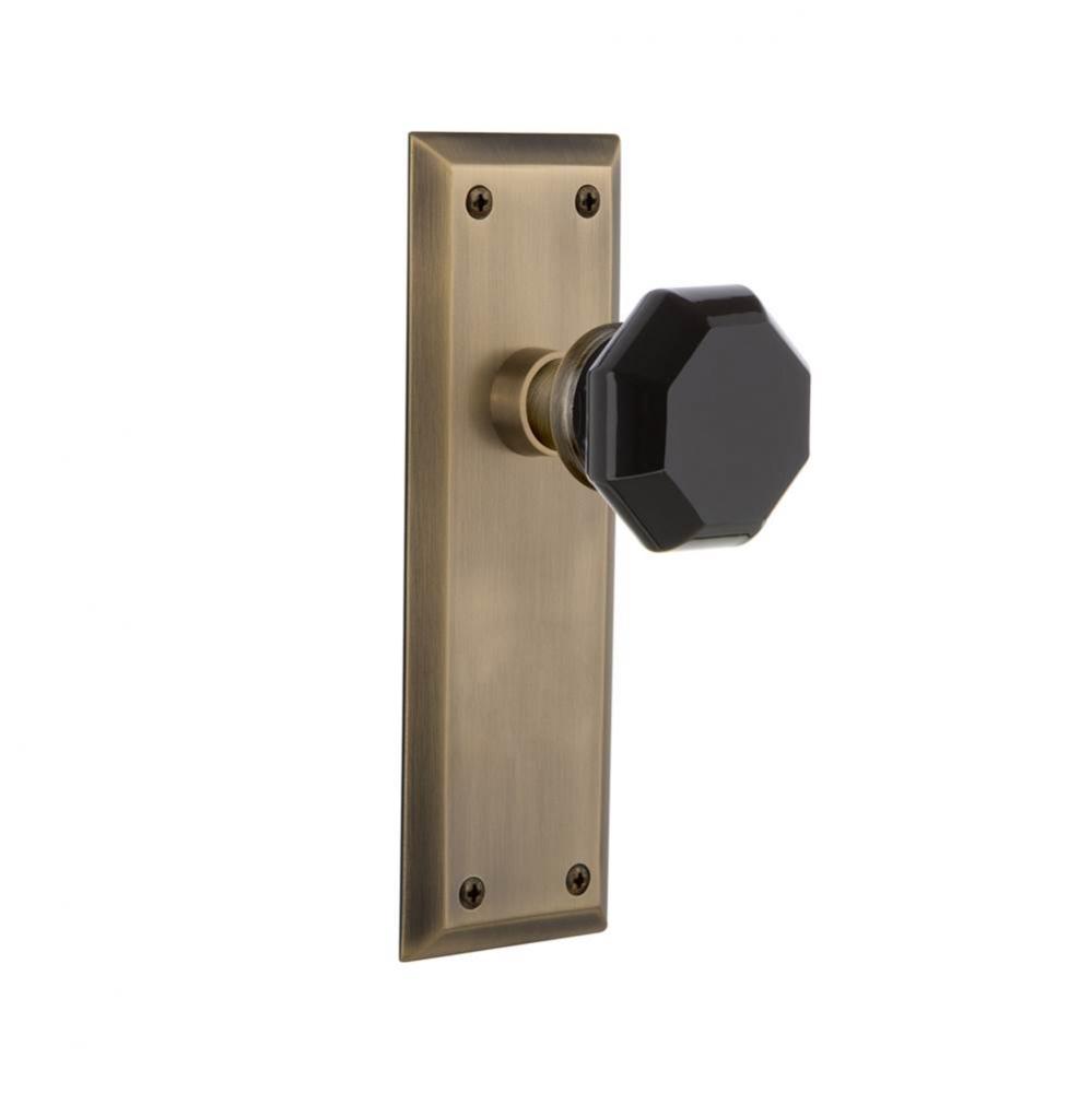 Nostalgic Warehouse New York Plate Passage Waldorf Black Door Knob in Antique Brass