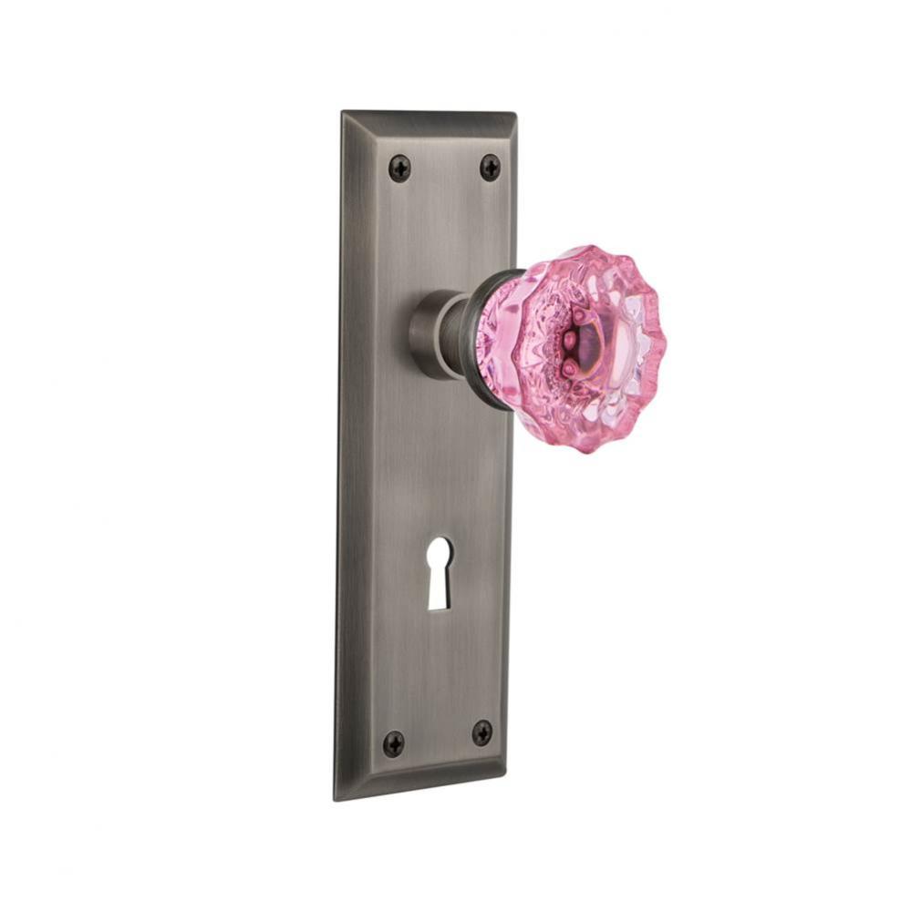 Nostalgic Warehouse New York Plate with Keyhole Passage Crystal Pink Glass Door Knob in Antique Pe