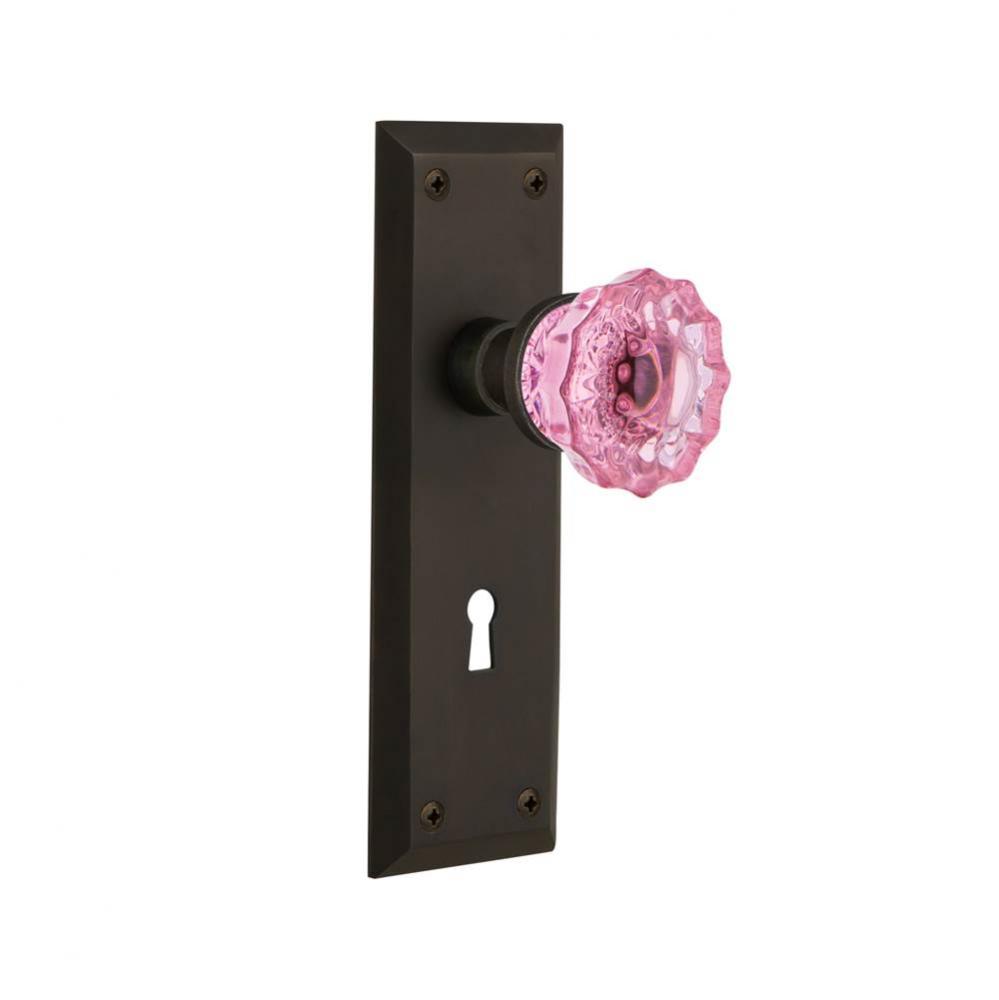 Nostalgic Warehouse New York Plate with Keyhole Passage Crystal Pink Glass Door Knob in Oil-Rubbed