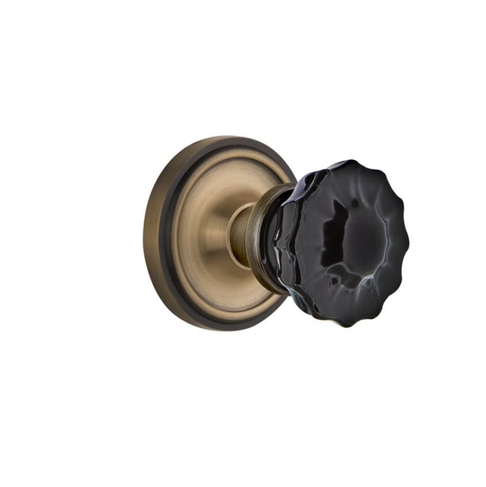 Nostalgic Warehouse Classic Rosette Double Dummy Crystal Black Glass Door Knob in Antique Brass