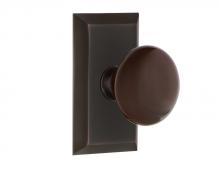 Nostalgic Warehouse 707870 - Nostalgic Warehouse Studio Plate Passage Brown Porcelain Door Knob in Timeless Bronze