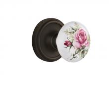 Nostalgic Warehouse 708473 - Nostalgic Warehouse Classic Rosette Passage White Rose Porcelain Door Knob in Oil-Rubbed Bronze