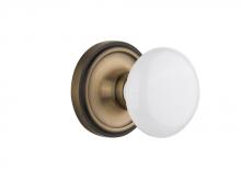 Nostalgic Warehouse 708493 - Nostalgic Warehouse Classic Rosette Passage White Porcelain Door Knob in Antique Brass