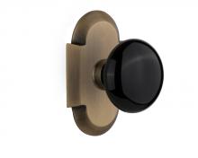 Nostalgic Warehouse 708501 - Nostalgic Warehouse Cottage Plate Passage Black Porcelain Door Knob in Antique Brass