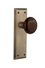 Nostalgic Warehouse 710557 - Nostalgic Warehouse New York Plate Single Dummy Brown Porcelain Door Knob in Antique Brass