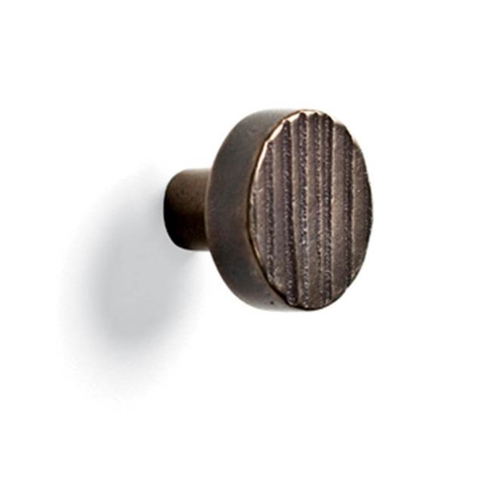 1 1/4'' Corduroy round flat cabinet knob.