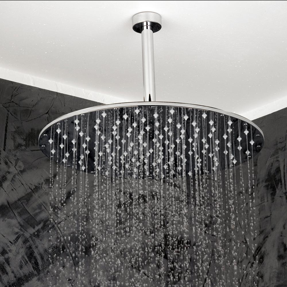 Ceiling-mount tilting round rain shower head, 330 rubber nozzles. Arm and flange sold separately.