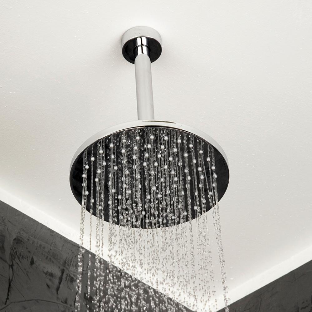 Wall-mount or ceiling-mount tilting round rain shower head, 95 rubber nozzles. Arm and flange sold