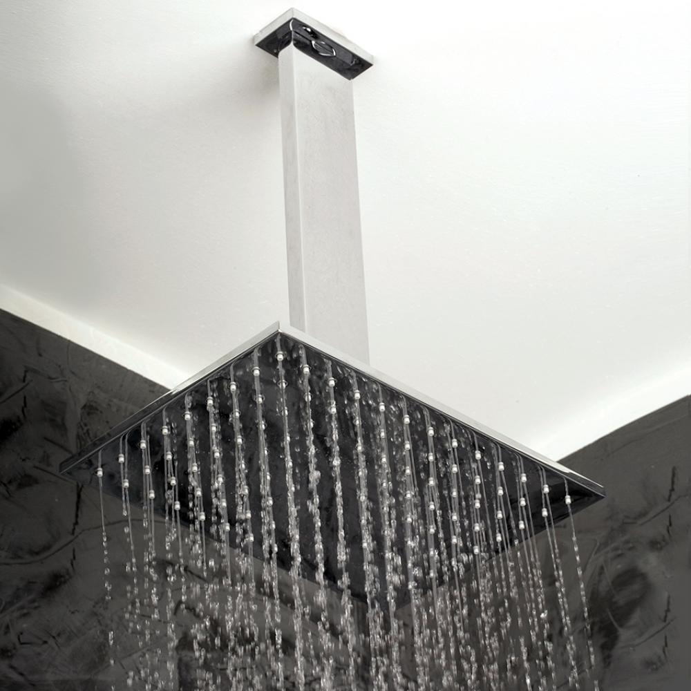Ceiling-mount tilting rectangular rain shower head, 117 rubber nozzles. Arm and flange sold separa