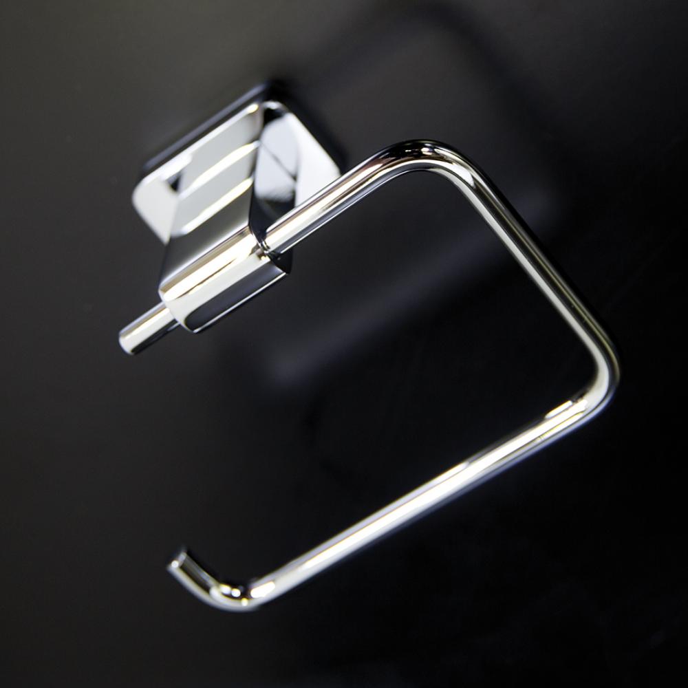 Wall mount toilet paper holder made of chrome plated brass. W: 5 3/8'', D: 2 5/8'&a