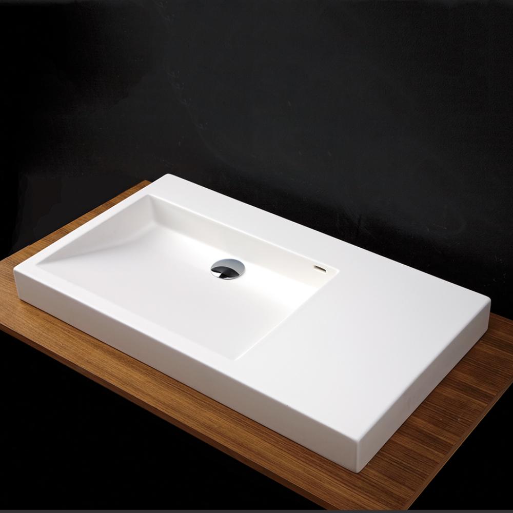 Vanity top Bathroom Sink with shelf on the left, made of solid surface, with an overflow.