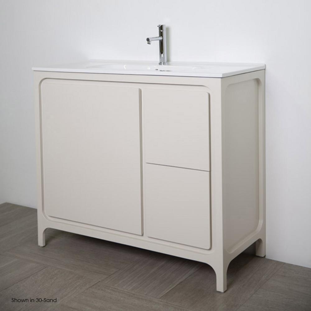 Free standing under counter vanity with routed finger pulls on two drawers and one door.