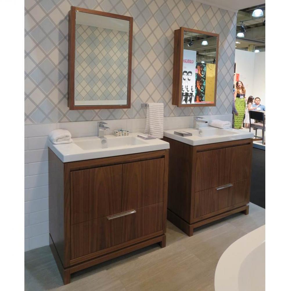 Free-standing under-counter vanity with finger pulls across top doors and polished chrome pulls ac