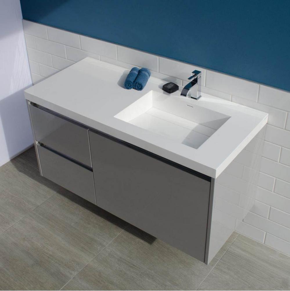 Wall-mounted undercounter vanity with  a large drawer on right and 2 small drawers on left