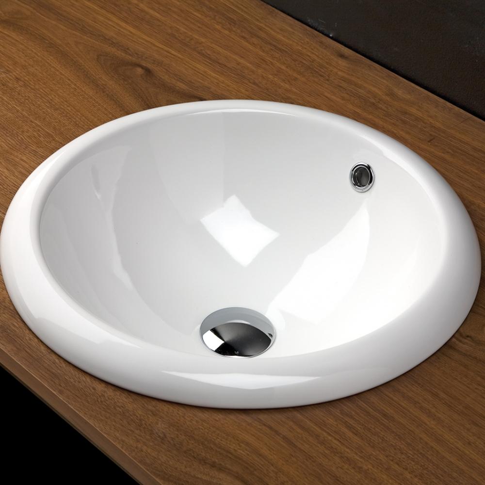 Self-rimming porcelain Bathroom Sink with an overflow. Unglazed bottom. 17 3/4'' DIAM, 7