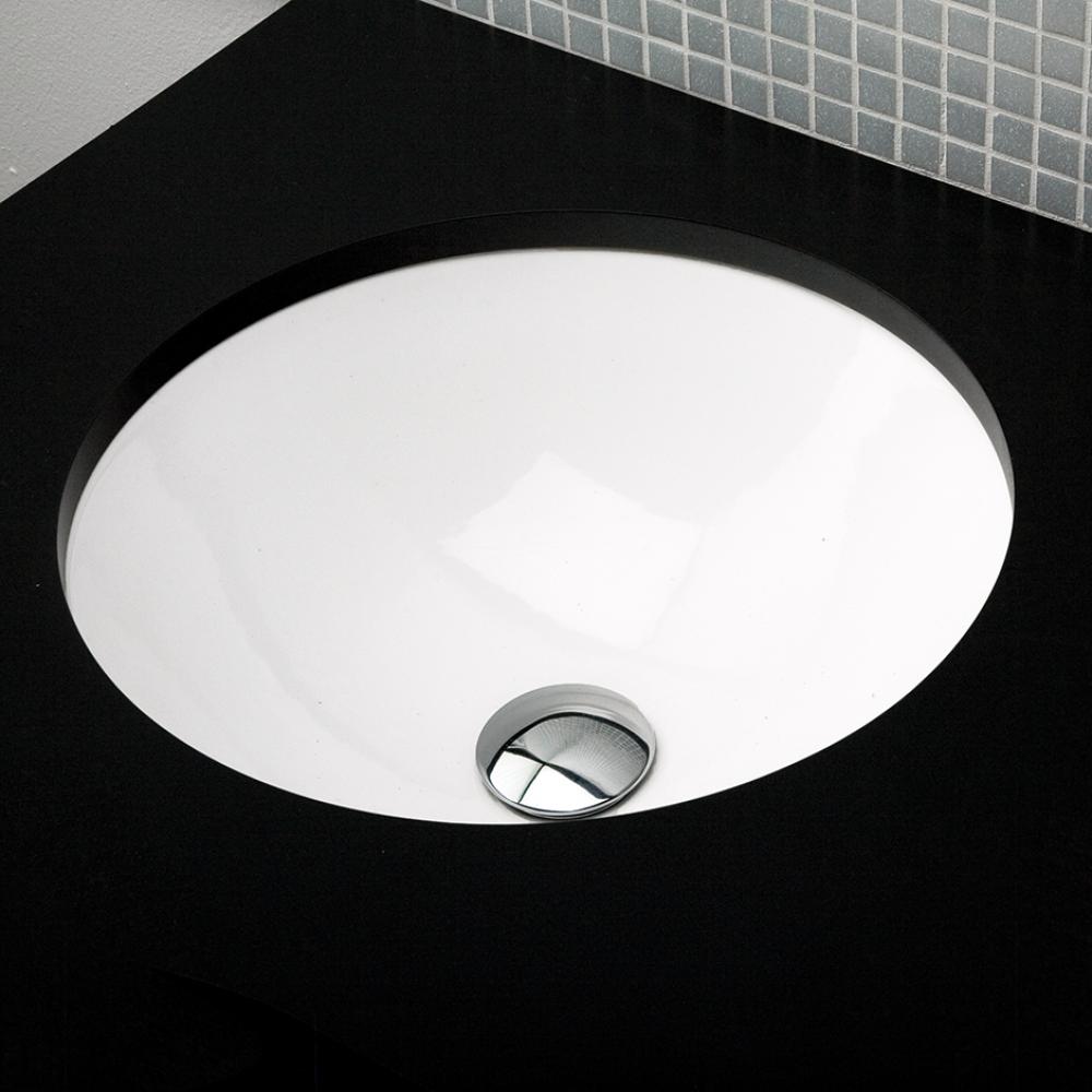 Under-counter porcelain Bathroom Sink with an overflow. Unglazed exterior. DIAM: 17 1/8'&apos