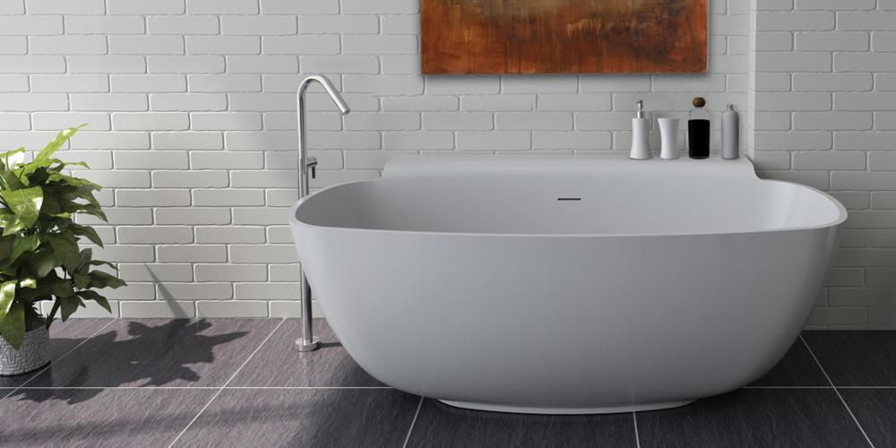 Free-standing soaking bathtub made of white solid surface with an overflow, net weight 286 lbs, wa