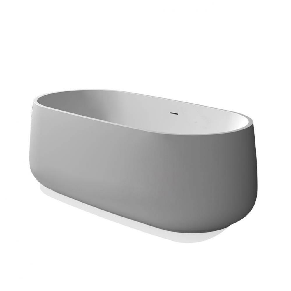 Free-standing soaking bathtub made of white solid surface with overflow and a decorative solid sur