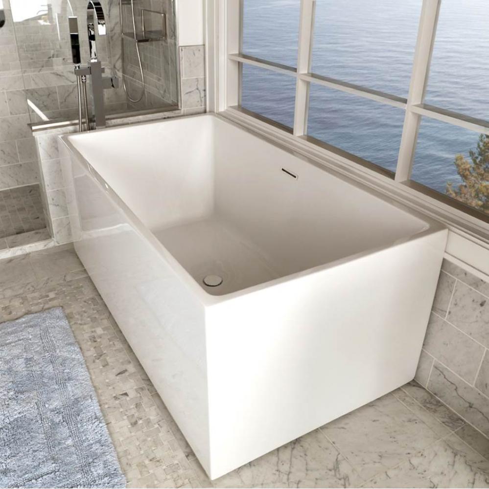 Free-standing soaking bathtub made of luster white acrylic with an overflow and polished chrome dr