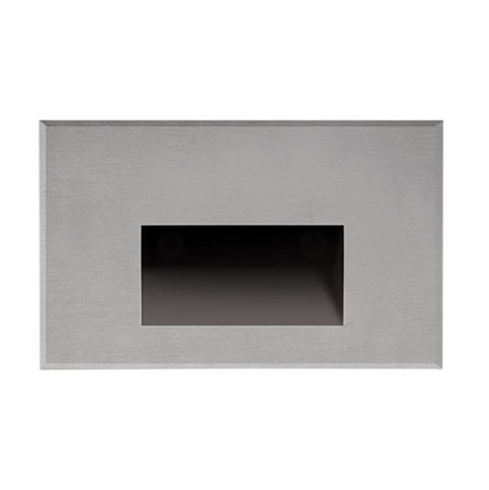 A Vertical Rectangle-Shaped Recessed Light In Matte Black Or White Powder Coat. The Optically